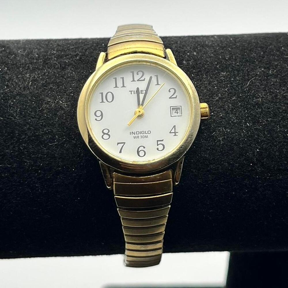 Vintage gold timex watch